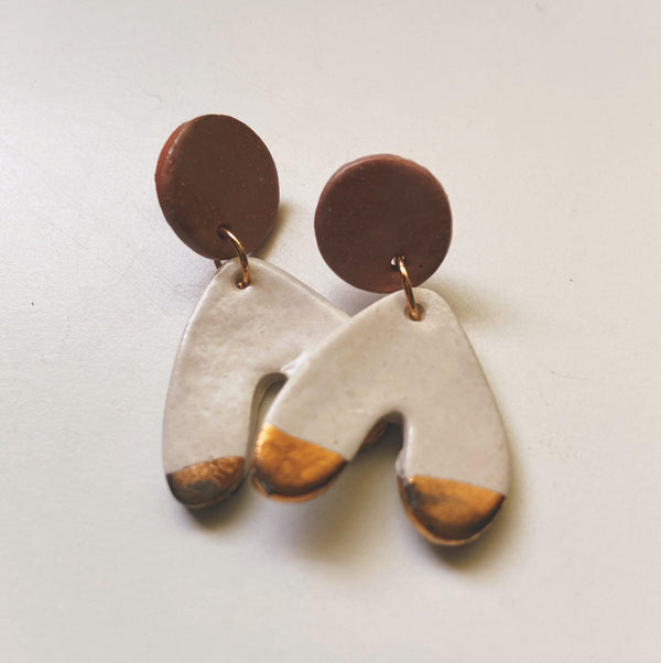 Matte white , mauve and gold on abstract arch earrings