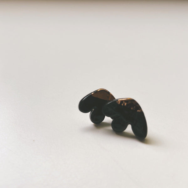 Black and gold abstract studs