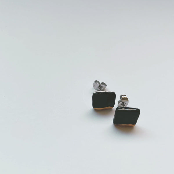 square black and gold dipped ceramic studs