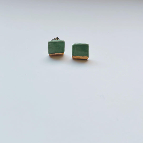 Square gold dipped studs - gloriafaye