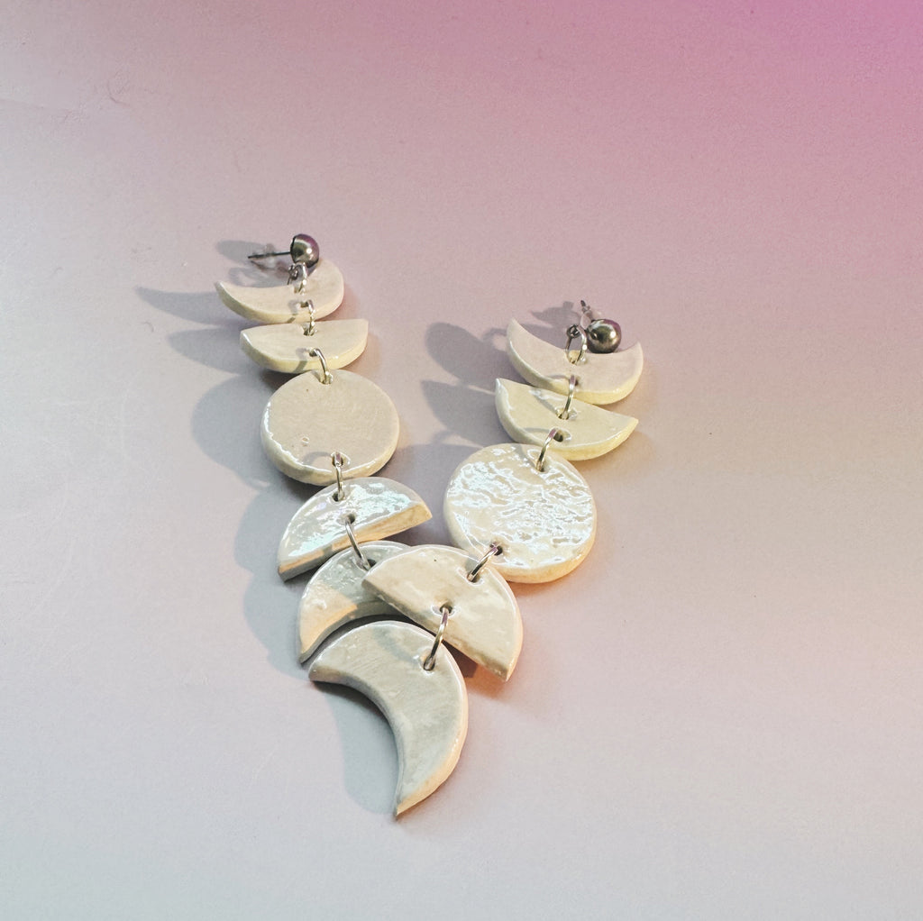 ceramic moon phase statement earrings