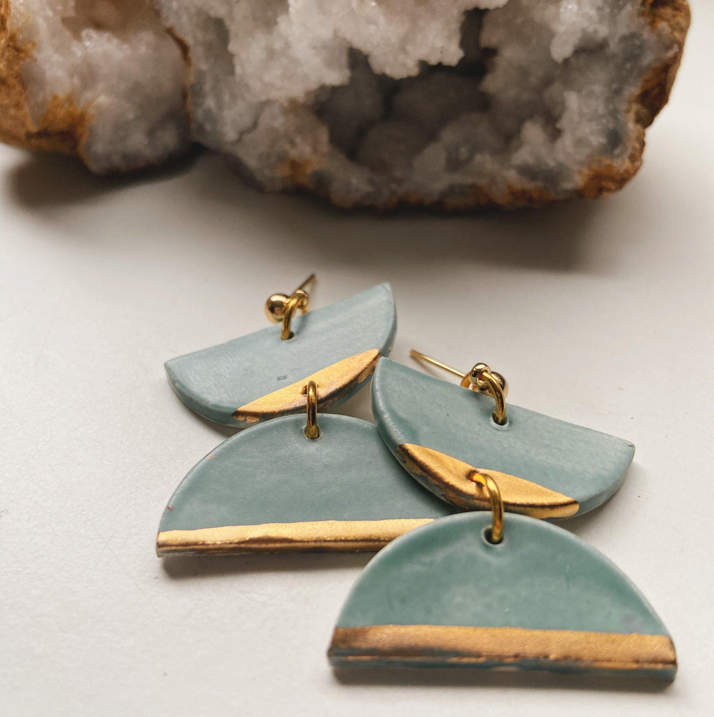 matte blue and gold dangle earrings