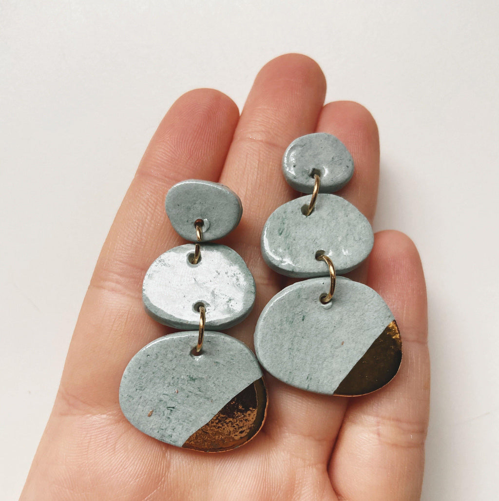 blue and gold ceramic earrings