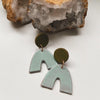 arch statement ceramic earrings