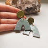arch statement ceramic earrings